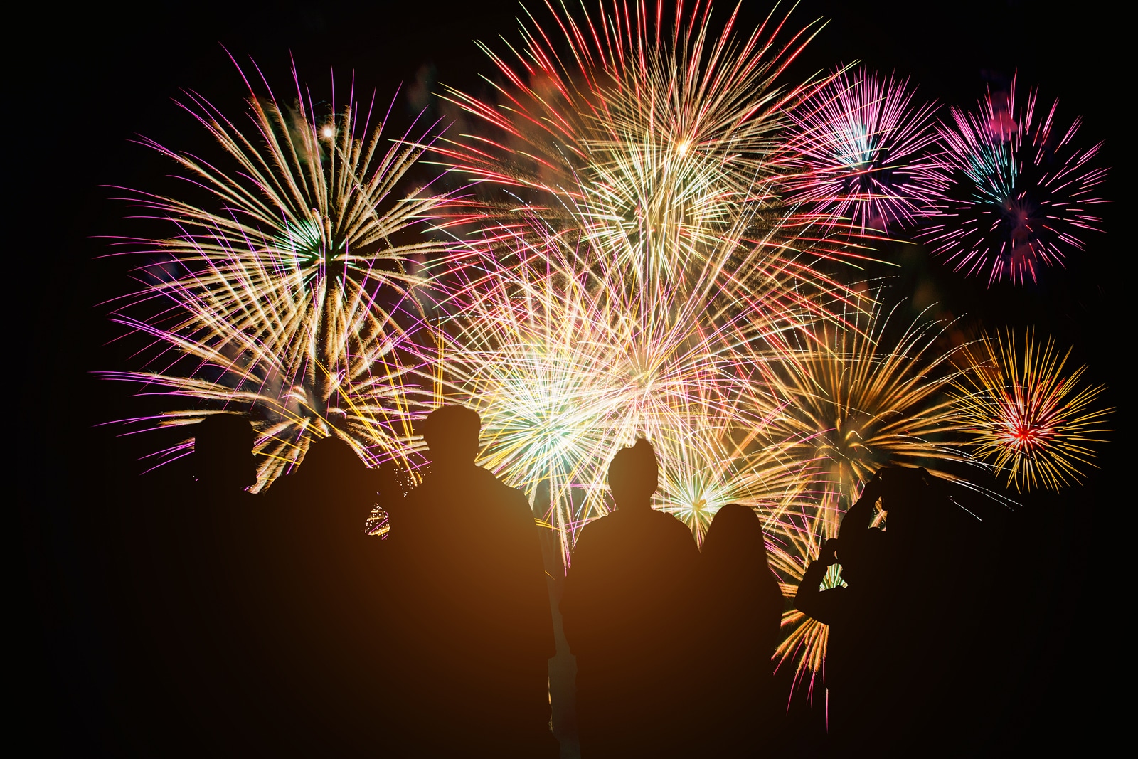 Outline of people watching fireworks to represent small business owners celebrating having chosen topics for blog posts. Learn how to choose blog post topics that will truly help your ideal clients.