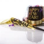 Party favors including a hat that says "happy new year." This blog post is about setting SEO marketing goals for therapists. Making sure to set realistic goals for website search engine optimization.