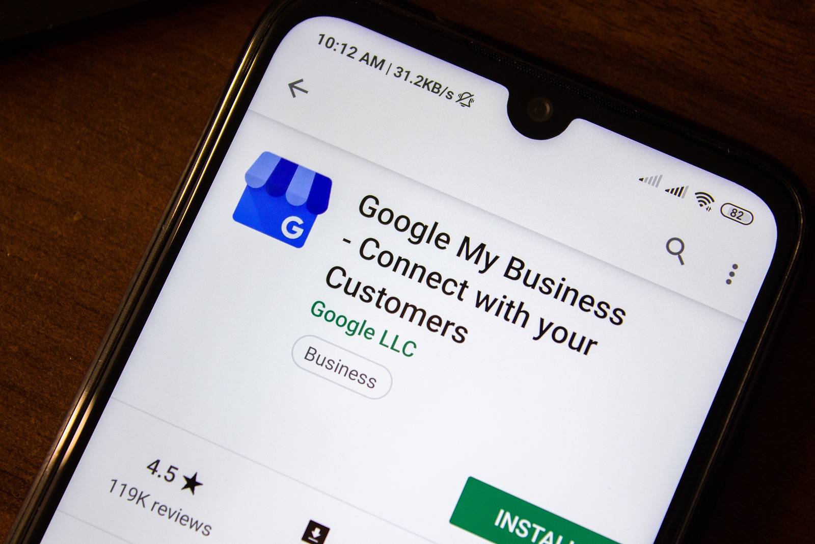 Google My Business on phone screen. This is just one example of SEO tools that can boost your online presence. Learn more here.