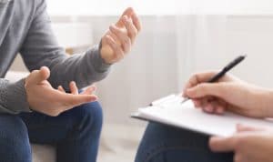 Psychotherapist meeting with a counseling client in their private practice