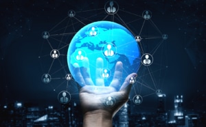 A hand holds a hologram of the earth that is surrounded by various profiles of people. Social media and SEO can go hand in hand if used correctly. Contact Simplified SEO Consulting for strategies for SEO marketing for therapists and other services.