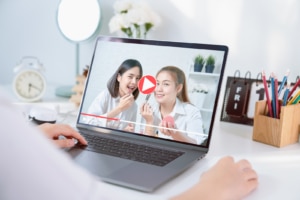Asian women doing tutorial on youtube. These individuals understand video and SEO which is how this person found their video. Youtube SEO can be a big boost for therapists looking to write blogs and vlog. Learn more about video seo from our seo specialists today!