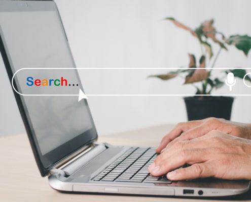 Image of someone surfing the web with a search bar over the image. This depicts how a therapist searching for an SEO consultant can do SEO themselves with SEO training.