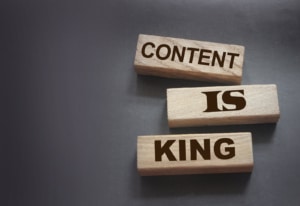 Image of “Content is King” written on three jenga blocks. Content is important when working on SEO for psychiatrists in private practice. Google values content on private pracite websites. Need help knowing what to put on your site? Our SEO services consultants specialize in helping build content for SEO for psychiatrists.