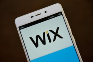Wix on Apple phone. Is your website mobile friendly? Perhaps, you have been told time and time again about wix and SEO. But does it actual provide effective results? Learn more from our SEO specialists who work with Wix platforms. Learn is Wix a good website and is Wix good for blogging?