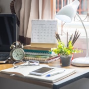 Image of a desk full of notebooks and a computer. Do you think you need an SEO tune up? Read more for tips on when and how to do them. We provide SEO for therapists and SEO for mental health professionals. Call today to schedule SEO services consulting.