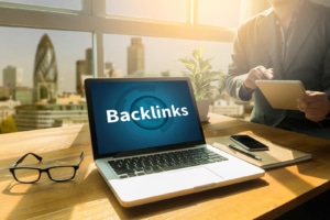 Backlinks on computer. Needing support with your SEO strategy development is ok. That is why we are mental health seo specialists. Get support with Large-Scale SEO for your website. Book a consult!