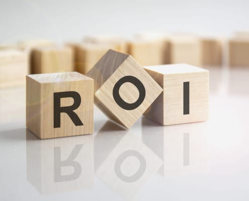 Blocks with the letters "ROI" on them. This photo represents how therapists can get great ROI with SEO services for therapists.
