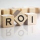 Blocks with the letters "ROI" on them. This photo represents how therapists can get great ROI with SEO services for therapists.