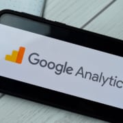 A close up of a phone screen with the logo of Google Analytics. Learn how an SEO specialist can offer support for your private practice website. Learn how Simplified SEO Consulting can offer support with private practice SEO today.