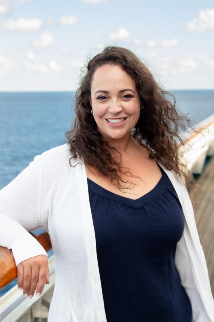 Photo of Danica Wolf, MSW and Chief Operating Officer of Simplified SEO Consulting on a cruise ship overlooking the ocean. She is a multipassionate entrepreneur and international educator and speaker on SEO for private practice owners having spoken in Oregon, Washington, Missouri, Spain, Florida, Kansas, Illinois, and beyond.