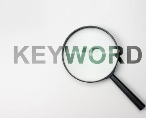 A magnifying glass on top of the word keyword. Looking to understand what healthcare SEO is and how it can help your practice? Our team works to improve SEO for medical practices. Begin with us today!