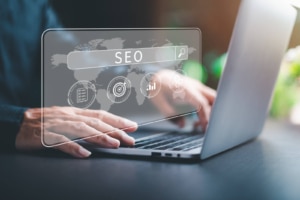SEO in search bar on laptop. SEO is great to grow your law firm, counseling practice or functional medicine practice. Learn more SEO tricks here!