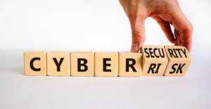 Cybersecurity on wooden blocks. Uncover the secrets to keeping your website safe! Contact us today to learn more about cybersecurity or SEO.