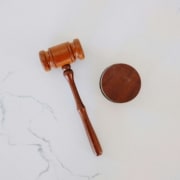 A wooden gavel on marble counter. Learn more about local SEO for personal injury lawyers here. We are ready to help you rank higher on Google!