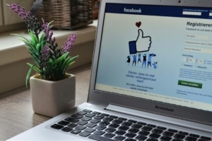Facebook's welcome sign up screen on a laptop. If you don't know where to start with social media, we can help. Our social media management package can help you reach your ideal clients.