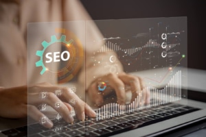 Picture of a medical practices SEO consultant working on a laptop. Functional medicine seo requires a strategic and consistent approach for optimal results. Learn how seo for holistic health and wellbeing can help your practice grow.