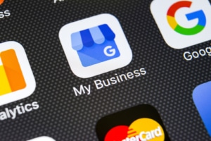 Close-up of the Google My Business app icon on a smartphone screen, highlighting how SEO for doctors and Local SEO for medical professionals rely on accurate online listings. Doctor SEO consulting often begins with optimizing Google Business Profiles for better Local SEO doctors marketing. 