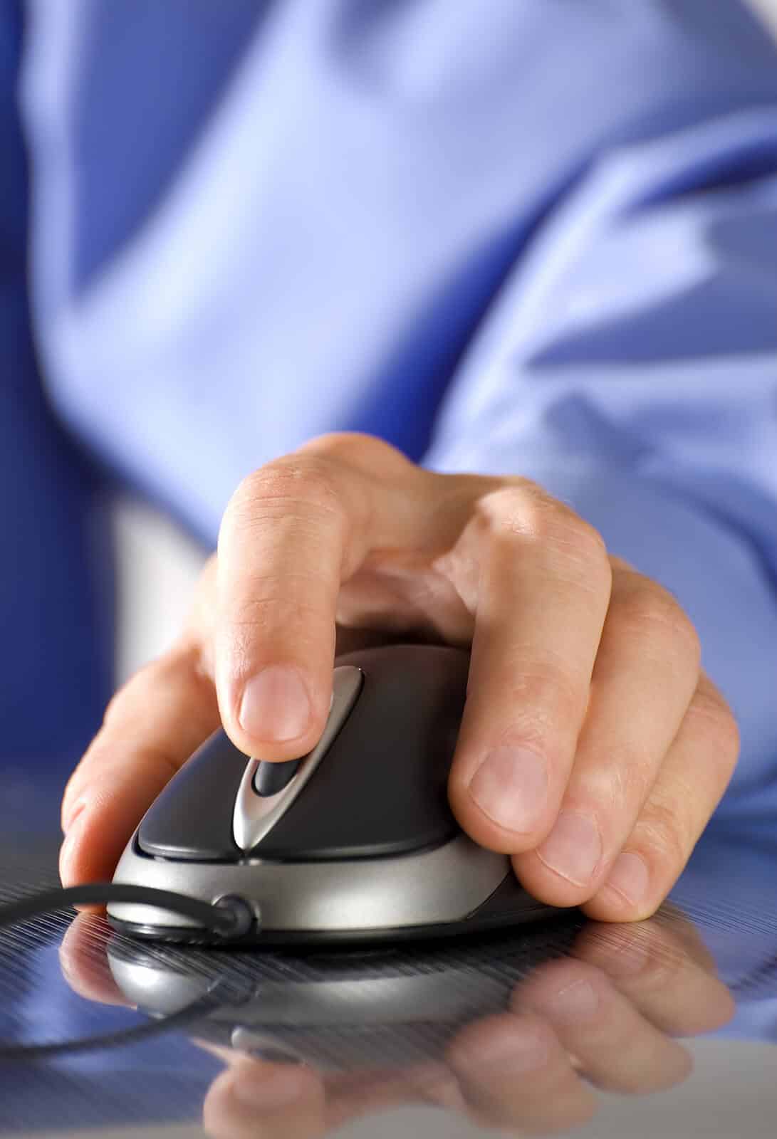 Mouse click | seo for functional medicine doctors | doctor seo consulting | medical practices seo consultant | United States A close-up of a hand clicking a computer mouse on a reflective surface. Thinking about SEO for functional medicine? A knowledgeable medical practices SEO consultant can help your holistic practice thrive by reaching patients searching for your care.