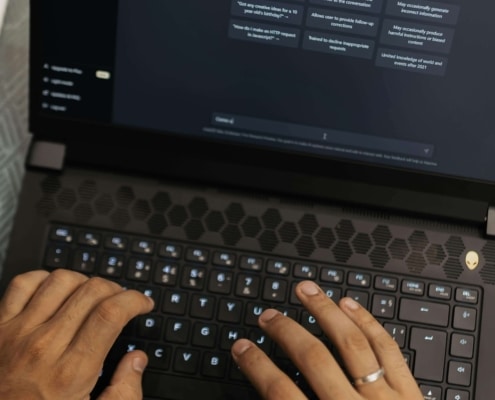 Close-up of a person using ChatGPT on a laptop to explore content strategy and digital trends relevant to SEO for functional medicine doctors, illustrating how doctor SEO consulting can support future-proof online visibility.