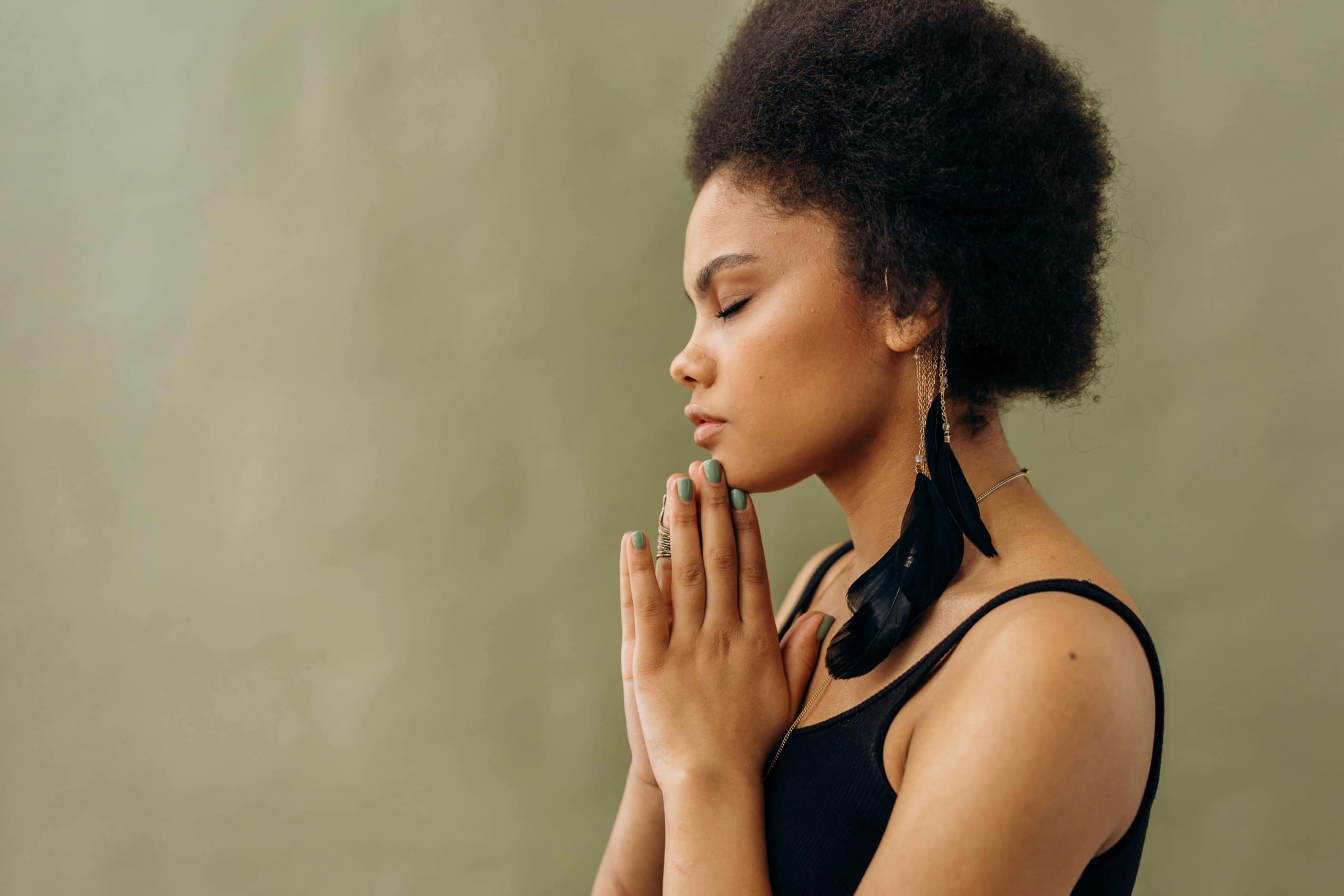 A woman practices mindful meditation with eyes closed, reflecting inner peace and healing. Alternative healing SEO aligns digital visibility with wellness values, and SEO consulting services help practitioners grow their online reach authentically.