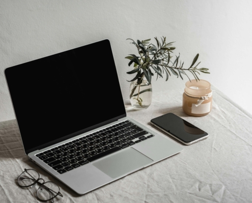 An open laptop with greenery arranged around it. Can search engine optimization for therapy practices happen from anywhere with the right strategy? SEO services for therapists create flexible, long-term plans that grow your practice's digital presence organically.