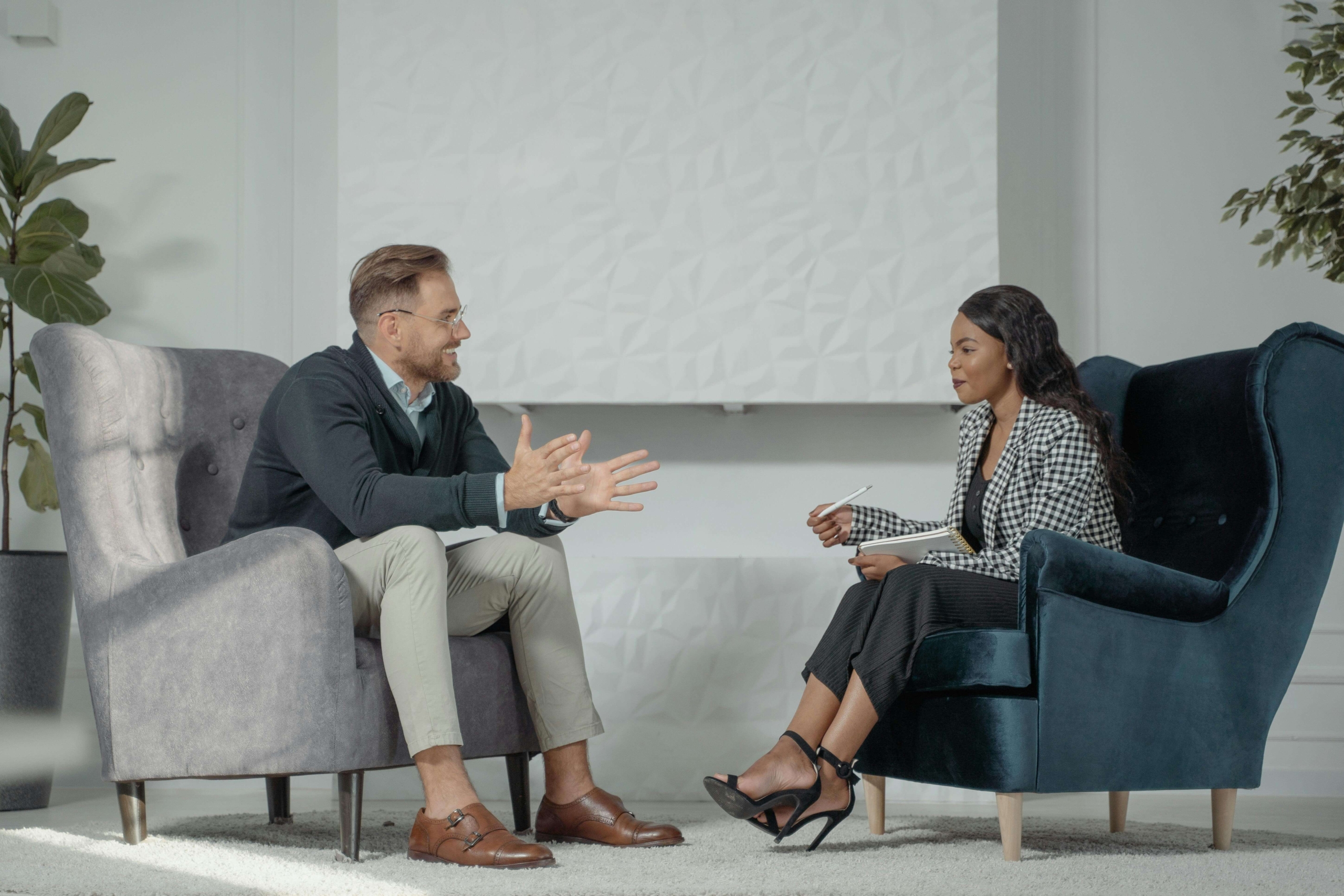 A therapist and client have an engaged conversation. While therapy practices thrive on connection, how do clients find you first? SEO for therapists ensures your practice appears when potential clients search for the support they need in your area.