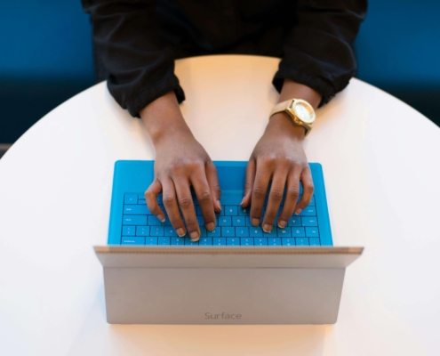 Close-up of a woman’s hands typing on a laptop. Are you curious about how seo for mental health professionals works? Learn how the right strategy can grow your practice by attracting your ideal clients.