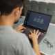 A man types a question into ChatGPT on his laptop, illustrating how quickly AI can generate confident-sounding responses. For therapists and helping professionals investing in SEO for mental health, understanding the difference between AI confidence and AI accuracy is an essential part of building a content strategy that actually serves your practice.